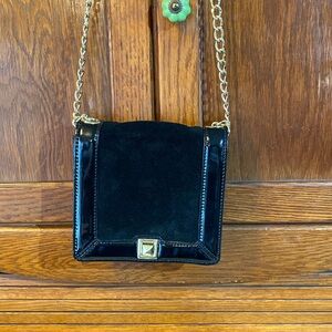 Talbots black leather and suede handbag, with gold hardware.